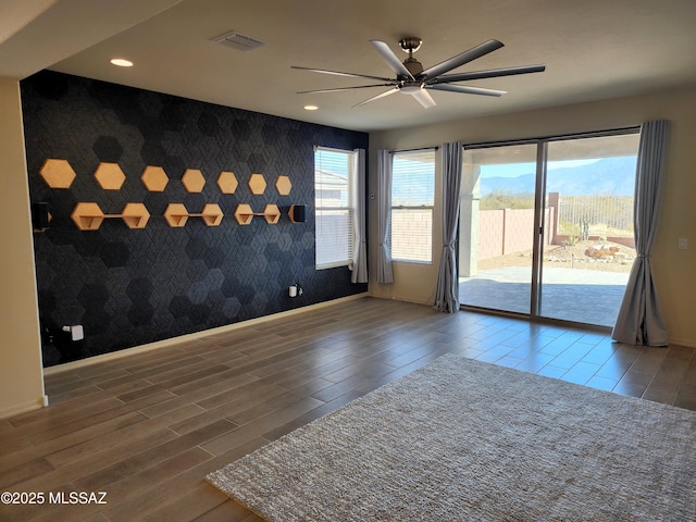 spare room featuring ceiling fan