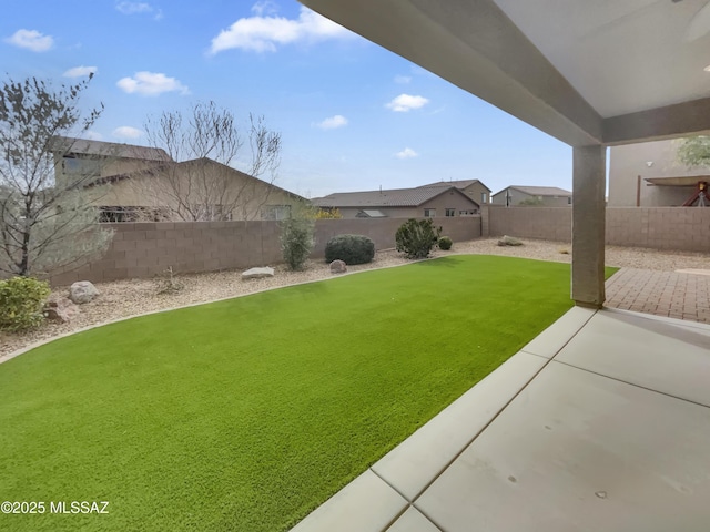 view of yard with a patio area