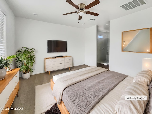 bedroom featuring ensuite bathroom and ceiling fan