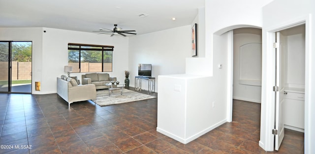 living room featuring ceiling fan