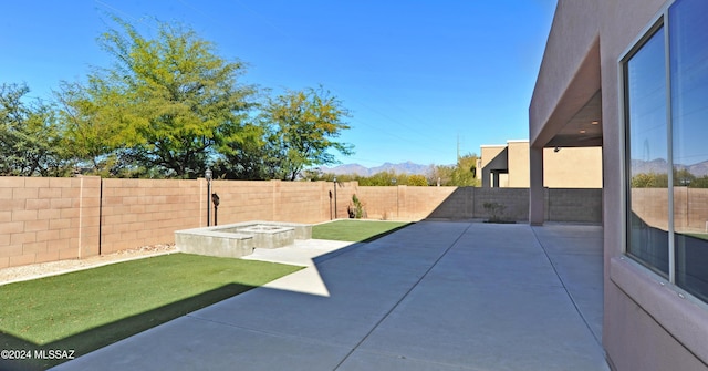 view of patio with a mountain view