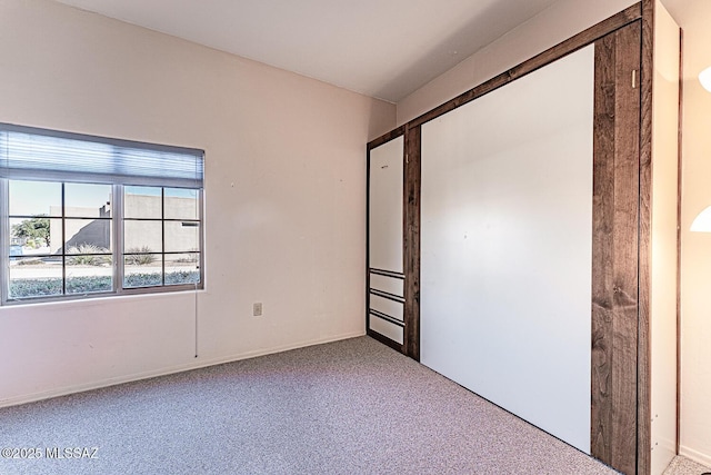 unfurnished bedroom with carpet flooring