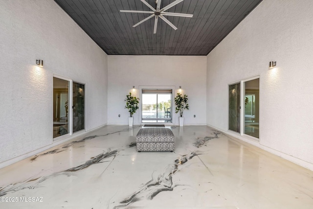 view of patio featuring ceiling fan