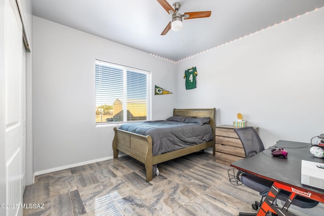 bedroom featuring ceiling fan