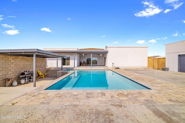 view of swimming pool with a patio