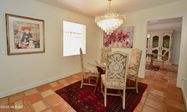 dining space with a chandelier