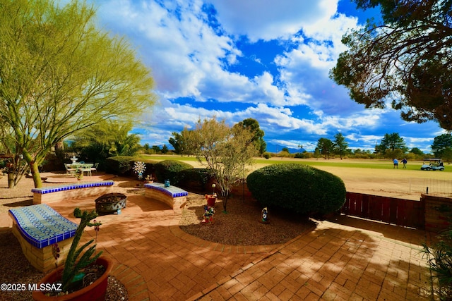 view of patio featuring a fire pit