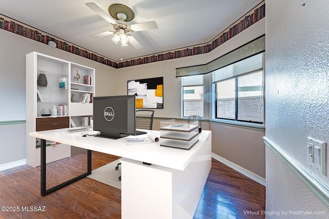 office space with ceiling fan and dark hardwood / wood-style floors