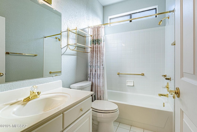 full bathroom with vanity, tile patterned floors, toilet, and shower / bath combo