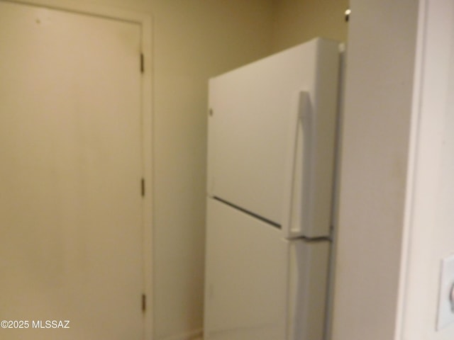 room details featuring white fridge