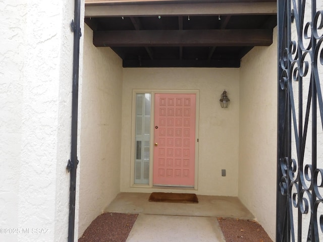 7932 N Casas Cameo, Tucson, AZ 85742 - doorway to property with stucco siding