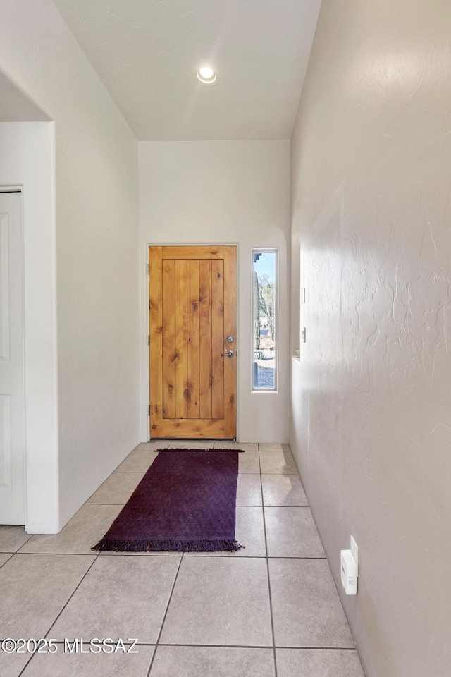 interior space featuring light tile patterned flooring