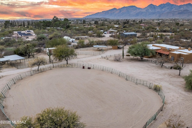 aerial view at dusk with a mountain view