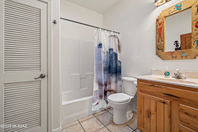 full bathroom featuring vanity, toilet, tile patterned flooring, and shower / bath combo with shower curtain