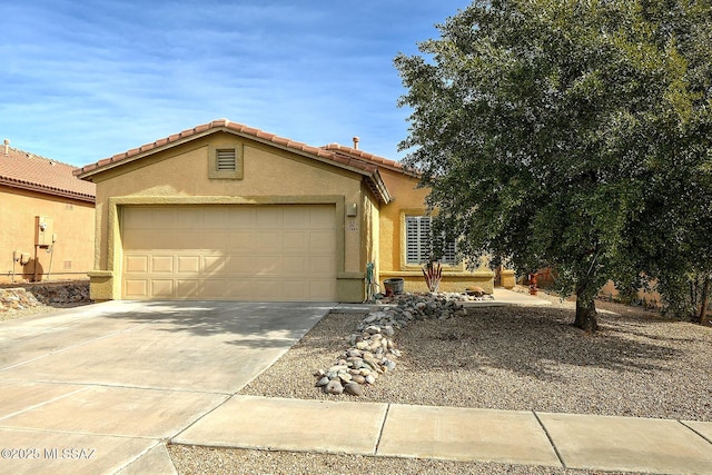 view of front of property featuring a garage