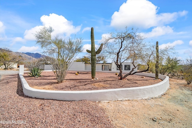 view of front of home with a mountain view