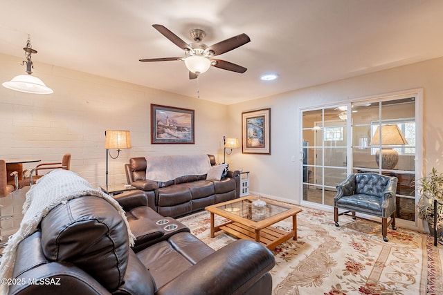 living room with ceiling fan