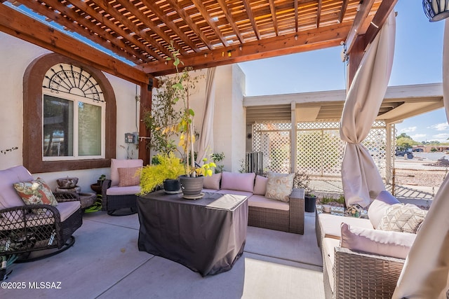 view of patio featuring outdoor lounge area and a pergola