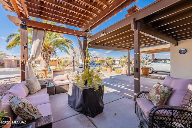 view of patio with outdoor lounge area and a pergola