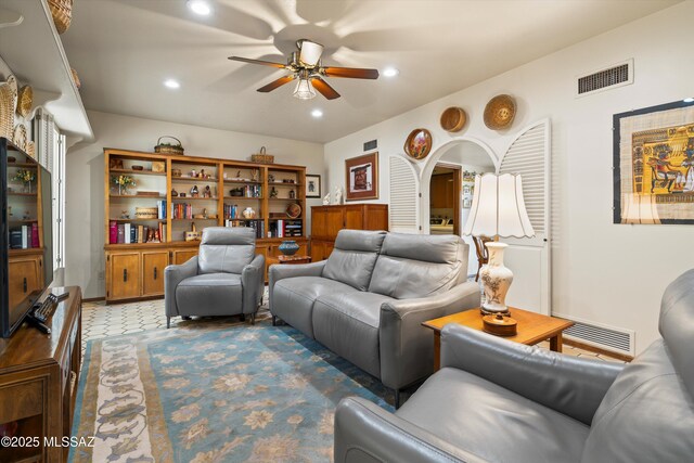 dining area with a textured ceiling, rail lighting, and visible vents