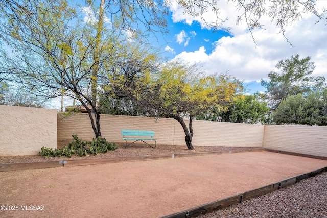 exterior space with a fenced backyard