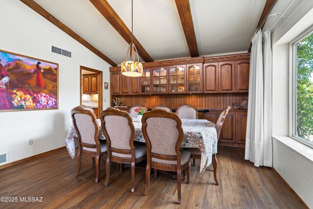 living room with a ceiling fan, arched walkways, a towering ceiling, visible vents, and dark wood-style floors