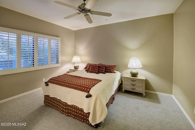 bedroom featuring carpet floors, ceiling fan, and baseboards