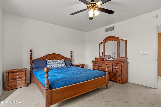 bedroom with light tile patterned floors and ceiling fan