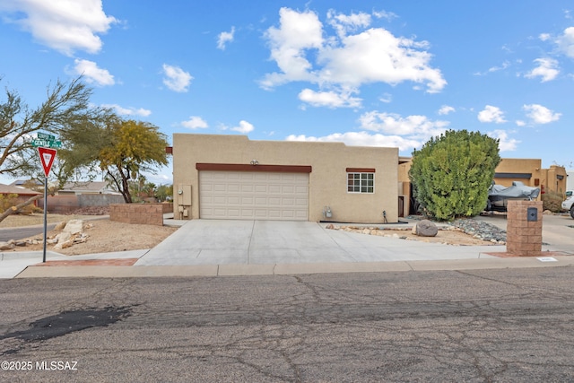 adobe home featuring a garage