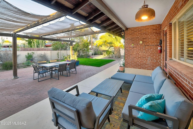 view of patio featuring an outdoor hangout area, outdoor dining area, and fence