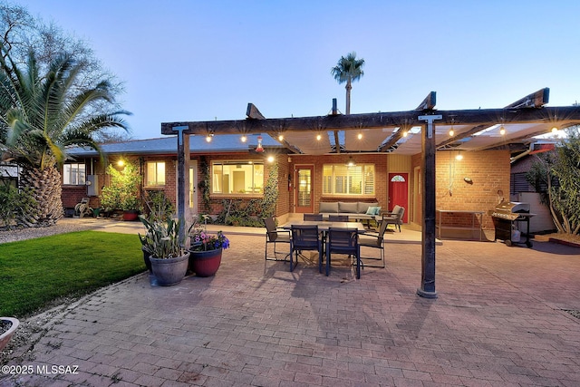 view of patio with outdoor lounge area and area for grilling