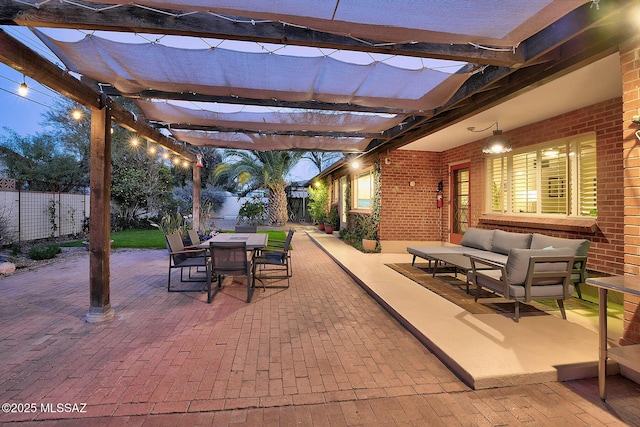 view of patio / terrace featuring outdoor dining area, fence, outdoor lounge area, and a pergola