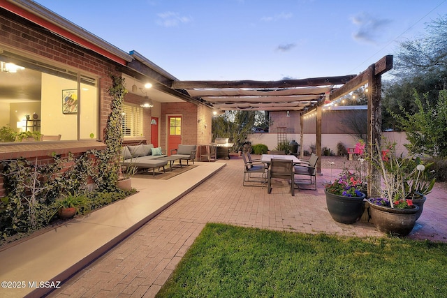 view of patio with fence and an outdoor living space