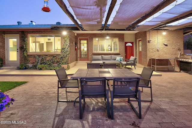 view of patio featuring an outdoor living space and a pergola