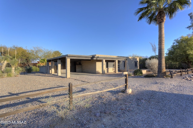 view of front of house with a carport