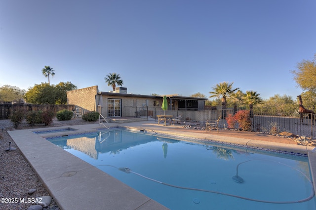 view of swimming pool featuring a patio