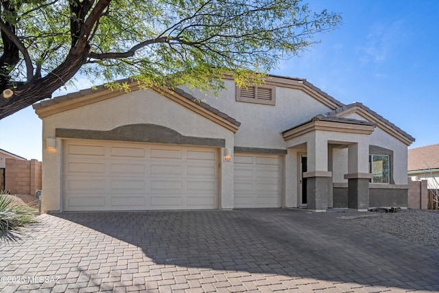 view of front of property with a garage