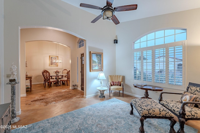 living area featuring ceiling fan