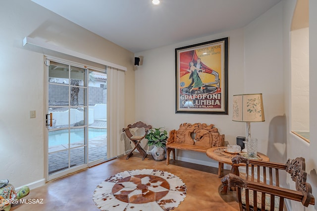 sitting room with concrete floors