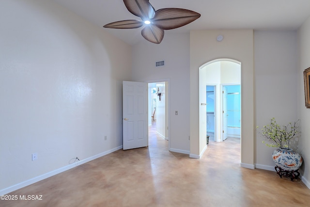 unfurnished room featuring high vaulted ceiling and ceiling fan