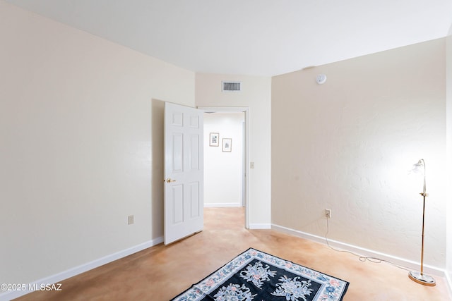 spare room featuring carpet flooring