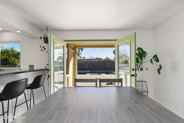 dining space featuring hardwood / wood-style floors