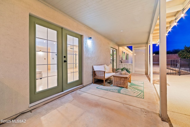 patio terrace at dusk with french doors