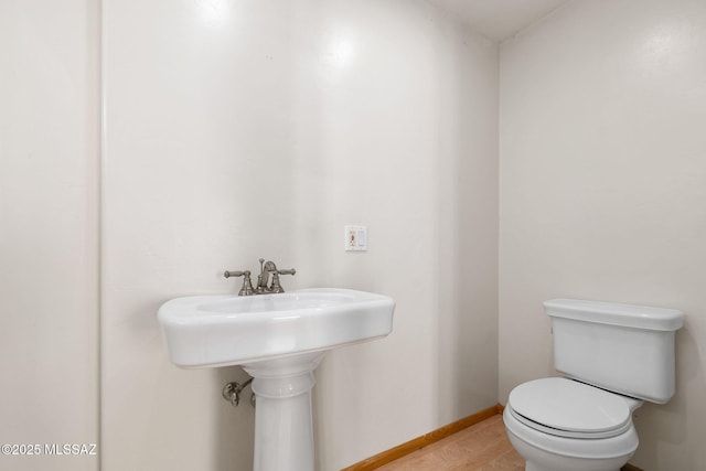 bathroom with sink and toilet