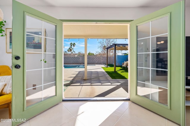 entryway featuring light tile patterned floors