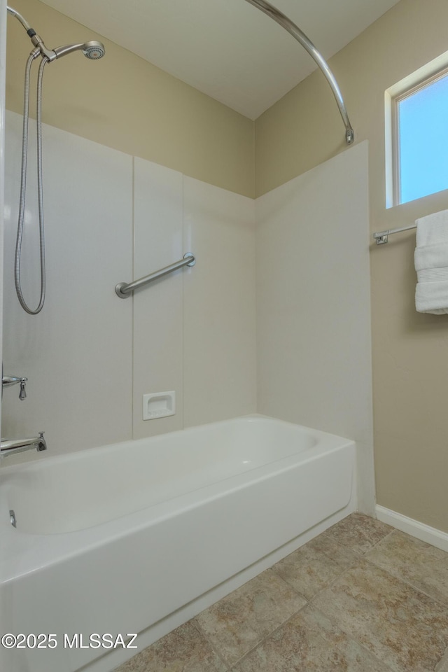 bathroom with shower / washtub combination