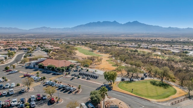 birds eye view of property with a mountain view