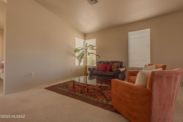 living room with high vaulted ceiling, carpet flooring, and ceiling fan