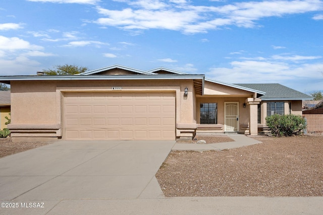 ranch-style house featuring a garage