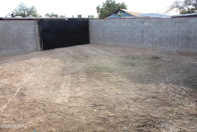 view of yard featuring fence